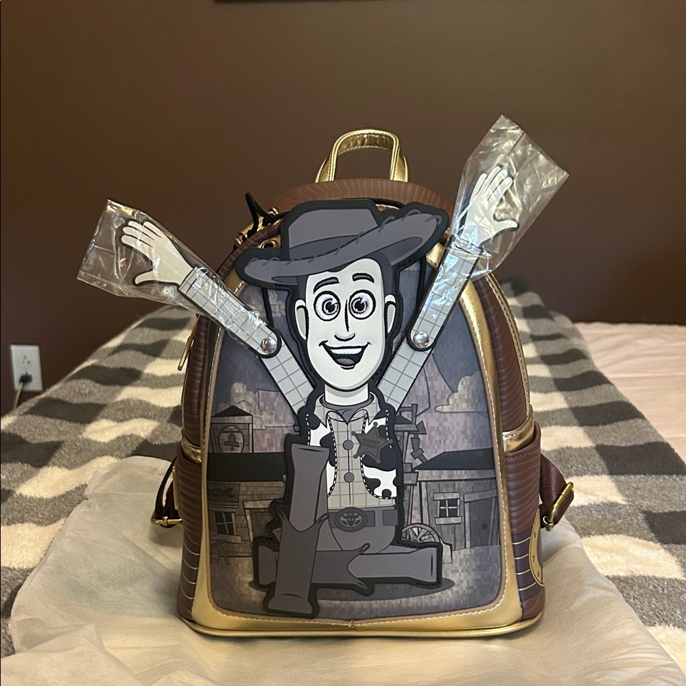 Disney Brown and Gold Backpack with Character Design